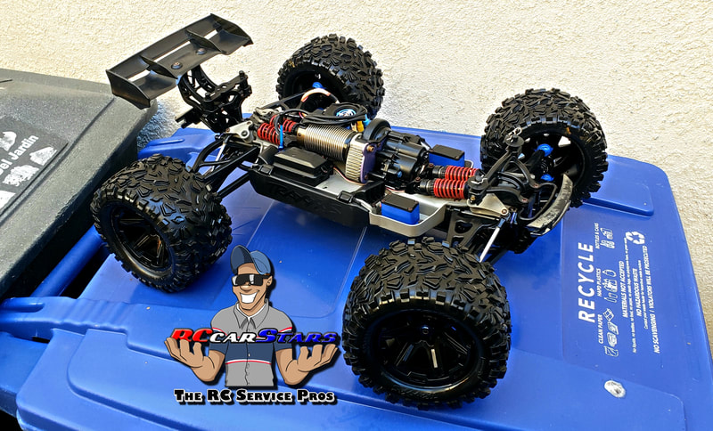 Customer purchased a used Traxxas Erevo off the internet. It came into the shop completely cover in white lithium grease, rusted, dirty and some minor worn parts. After a complete Super-TuneUp and major cleaning and replacing of worn parts, this used 3 year old Erevo looks like new!!